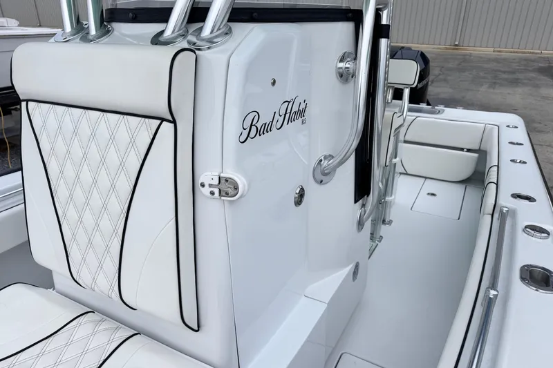 Slide: The Image of 2021 Contender 25 Tournament boat interior with custom seating and rod holders. - 7