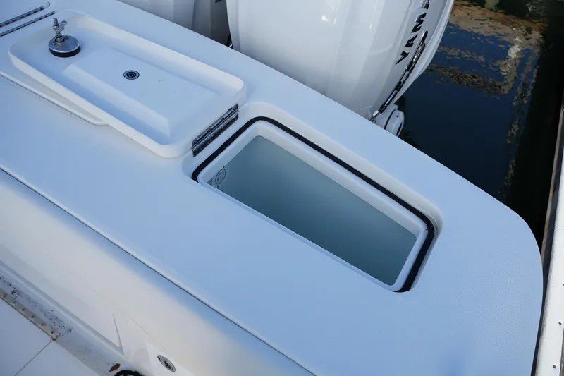 Slide: The Image of 2025 Regulator 37 boat with Yamaha engine, featuring a sleek white deck design. - 29