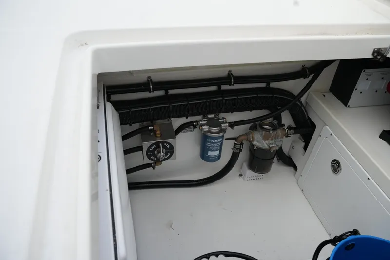 Slide: The Image of Engine compartment of 2025 Regulator 37 boat, showcasing fuel system components. - 35