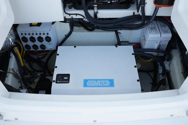 Slide: The Image of Engine compartment of 2025 Regulator 37 boat with Seakeeper unit and electrical components. - 45