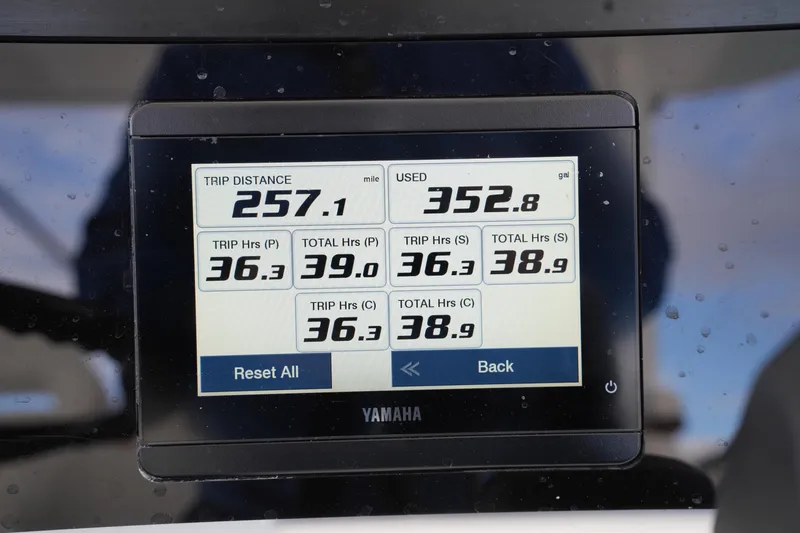 Slide: The Image of Display screen showing trip data: 257.1 miles, 352.8 gallons used, on a 2025 Regulator 37. - 54