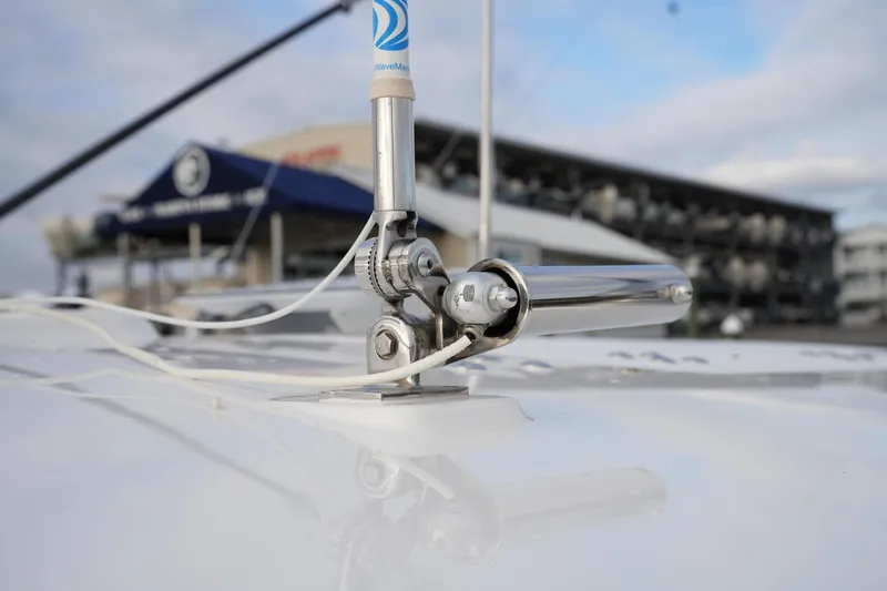 Slide: The Image of Antenna on 2025 Regulator 37 boat, marina background, clear sky. - 65