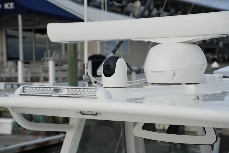 Slide: The Image of 2025 Regulator 37 boat with advanced radar and camera system on deck. - 67