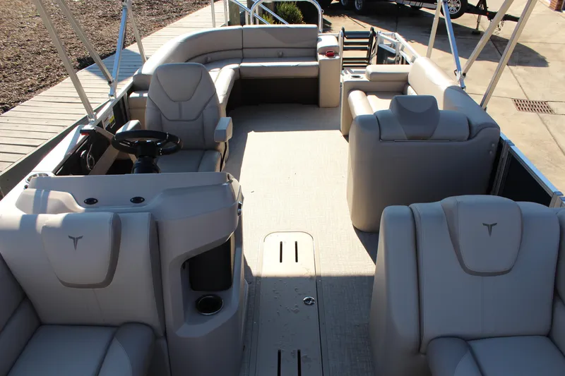 Slide: The Image of 2026 Tahoe Pontoon LTZ Elite interior with luxurious seating and modern design. - 13