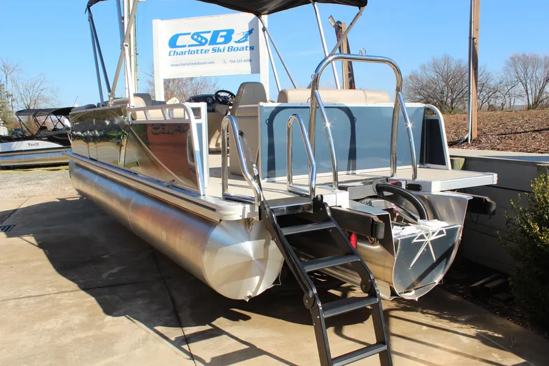 Slide: The Image of 2026 Tahoe Pontoon LTZ Elite boat with ladder, displayed at Charlotte Ski Boats. - 5