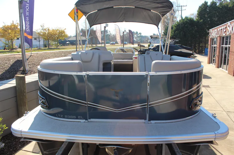Slide: The Image of 2026 Tahoe Pontoon LTZ Elite boat with sleek design and spacious seating. - 8