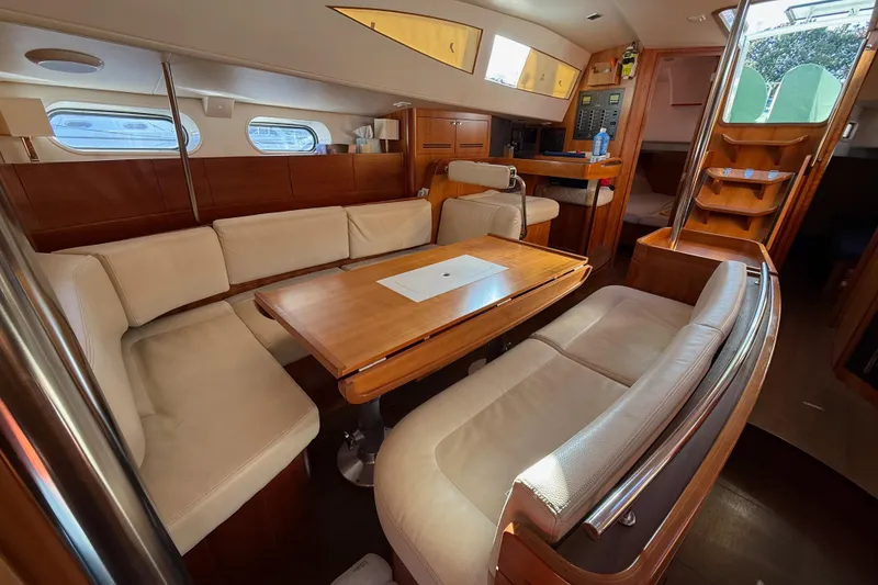 Slide: The Image of Luxurious interior of 2011 Allures 45 yacht with elegant wood and cream seating. - 3