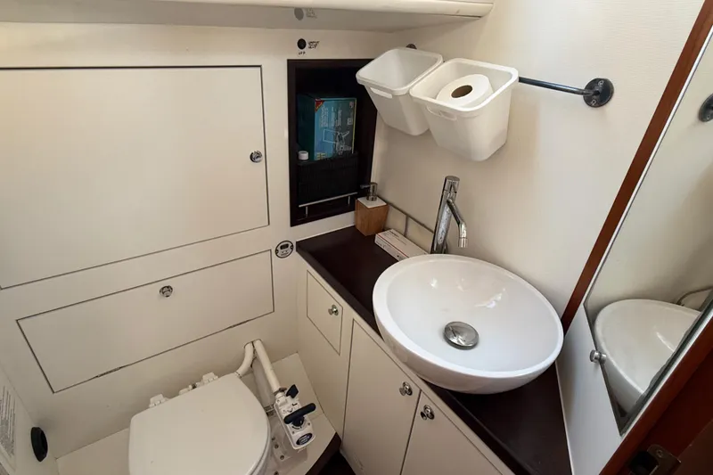 Slide: The Image of Bathroom interior of 2011 Allures 45 yacht with sink and toilet. - 6