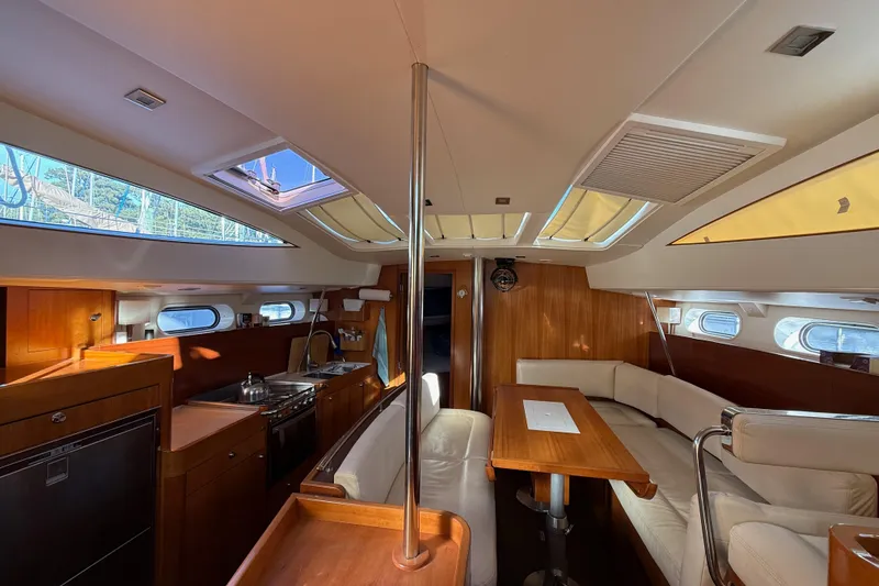 Slide: The Image of Luxurious interior of 2011 Allures 45 yacht with modern kitchen and seating area. - 8