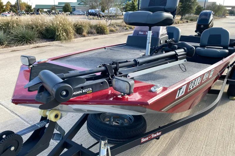 Slide: The Image of 2021 Tracker Bass Tracker Classic XL boat with Minn Kota trolling motor on trailer. - 3