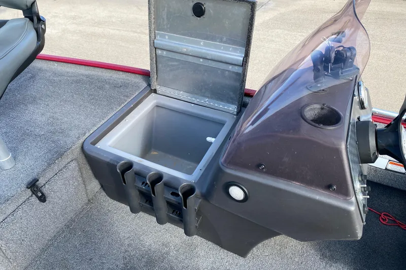 Slide: The Image of 2021 Tracker Bass Tracker Classic XL boat console with storage compartment open. - 5