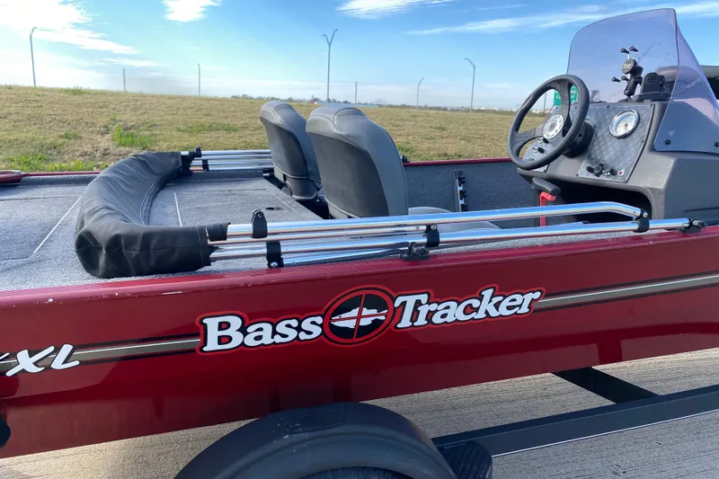 Slide: The Image of 2021 Tracker Bass Tracker Classic XL boat with dual seats and steering console. - 6