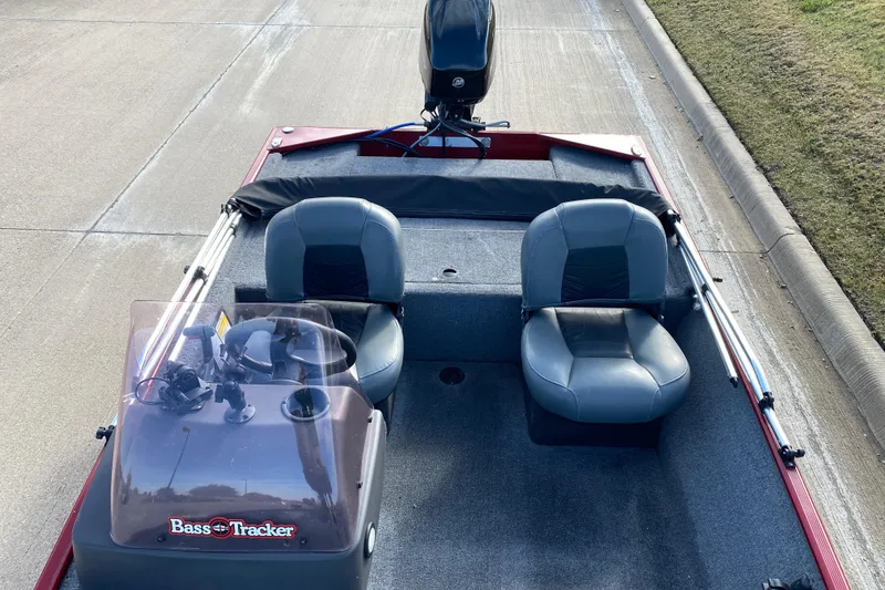 Slide: The Image of 2021 Tracker Bass Tracker Classic XL boat interior with two seats and steering console. - 7