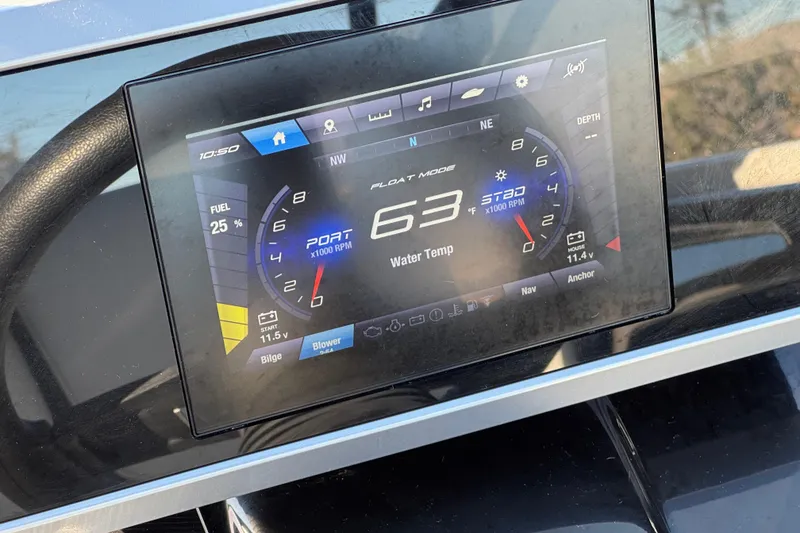 Slide: The Image of Dashboard display of 2023 Yamaha Boats AR250 showing speed, fuel, and water temperature. - 27