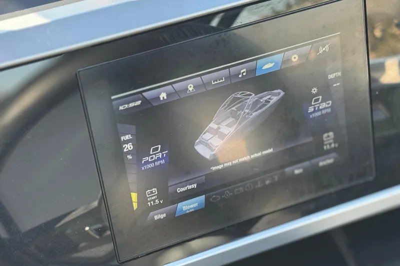 Slide: The Image of 2023 Yamaha Boats AR250 dashboard display showing fuel and RPM information. - 31