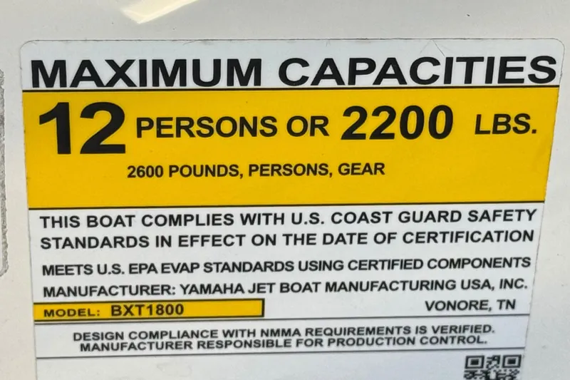 Slide: The Image of 2023 Yamaha Boats AR250 capacity label: 12 persons or 2200 lbs, U.S. Coast Guard compliant. - 37