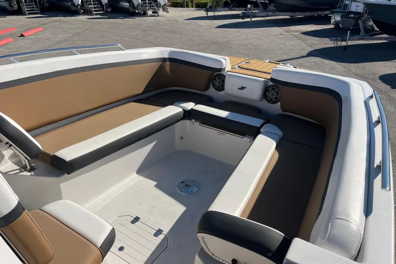 Slide: The Image of 2024 Starcraft SVX 231 OB CC boat interior with spacious seating and modern design. - 12