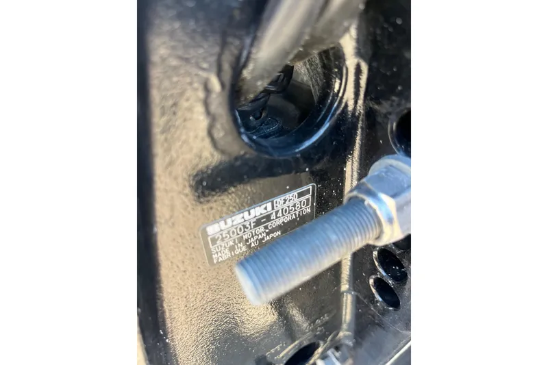 Slide: The Image of Close-up of Suzuki motor part on 2024 Starcraft SVX 231 OB CC boat. - 17