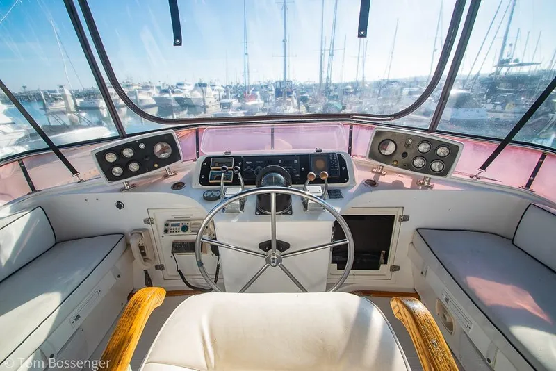 Slide: The Image of Cockpit of 1985 Spindrift 40 yacht with steering wheel and control panels. - 31