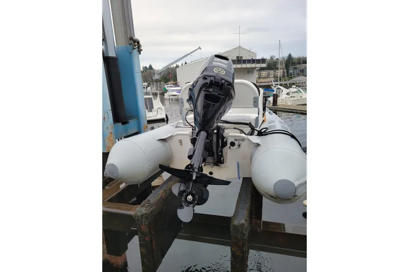 Slide: The Image of 2020 Inmar 330R-YS inflatable boat with outboard motor at marina dock. - 14