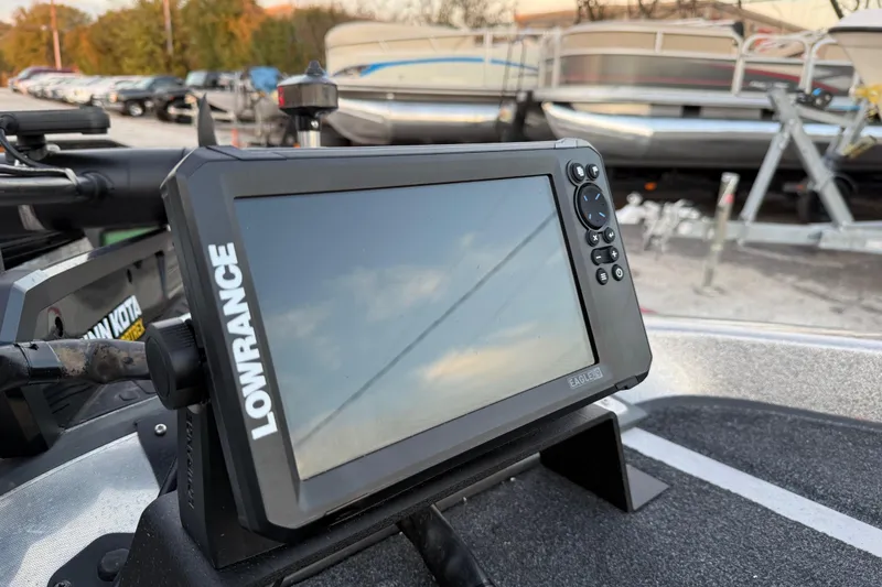 Slide: The Image of 2007 Ranger Z19 Comanche boat on trailer by lakeside, featuring Mercury Pro XS engine. - 16