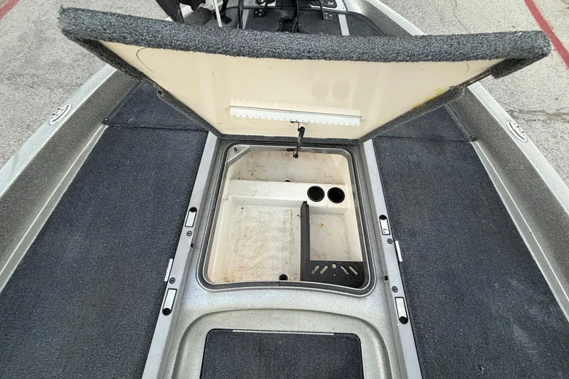 Slide: The Image of 2007 Ranger Z19 Comanche boat with Minn Kota Fortrex motor at a lakeside dock. - 20