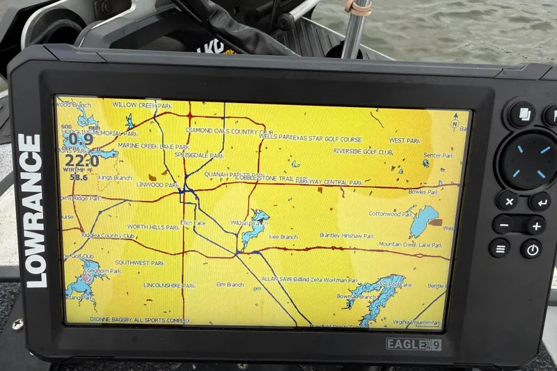 Slide: The Image of GPS navigation system on a 2007 Ranger Z19 Comanche boat, displaying a detailed map. - 32