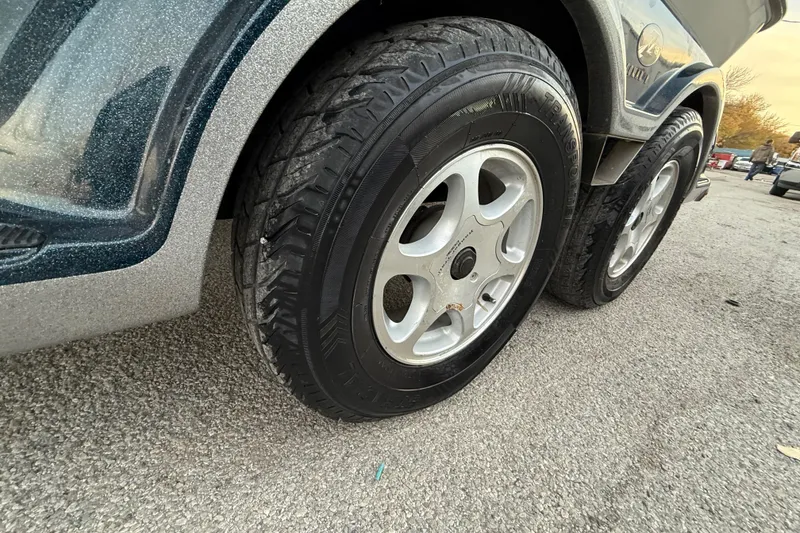 Slide: The Image of 2007 Ranger Z19 Comanche boat on trailer by lakeside, featuring Mercury Pro XS engine. - 5