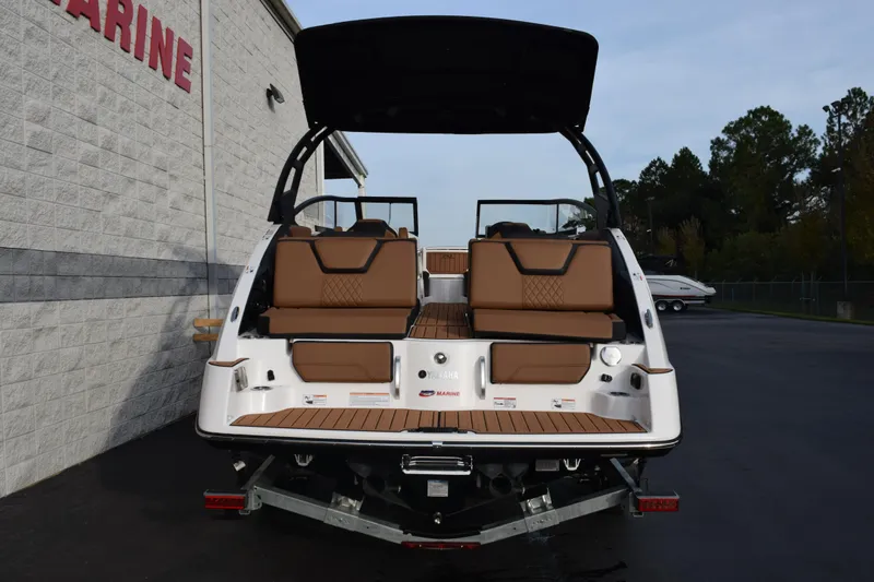 Slide: The Image of 2026 Yamaha Boats 252SD, rear view, showcasing luxurious seating and sleek design. - 5