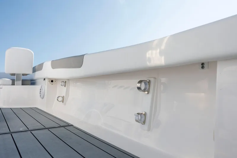 Slide: The Image of 2024 Caymas 26 HB boat interior with sleek white design and modern fittings. - 29