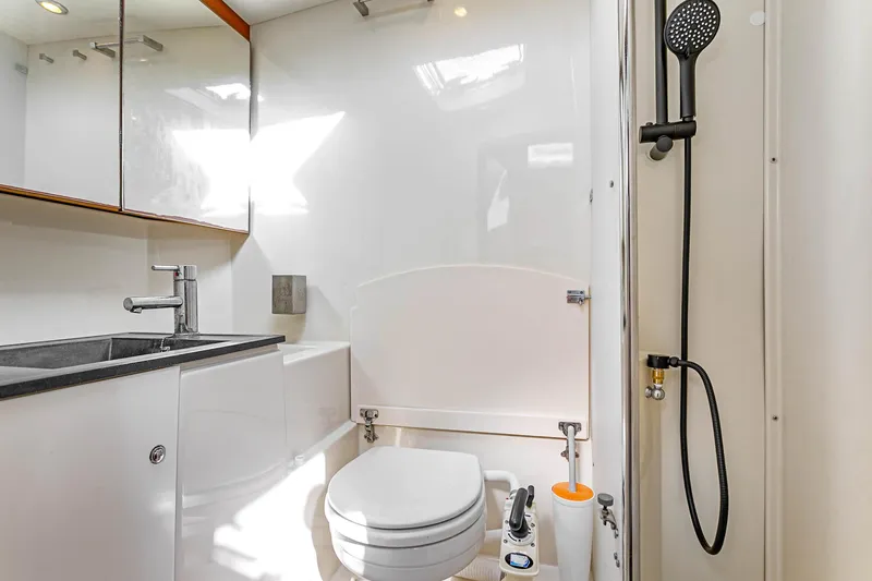 Slide: The Image of Modern bathroom on 2011 Dufour 525 Grand Large yacht with sleek fixtures and shower. - 31