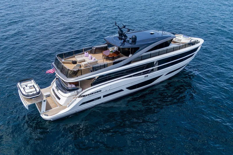 Slide: The Image of Luxurious 2022 Princess X95 yacht cruising on open sea, featuring elegant design and spacious decks. - 10