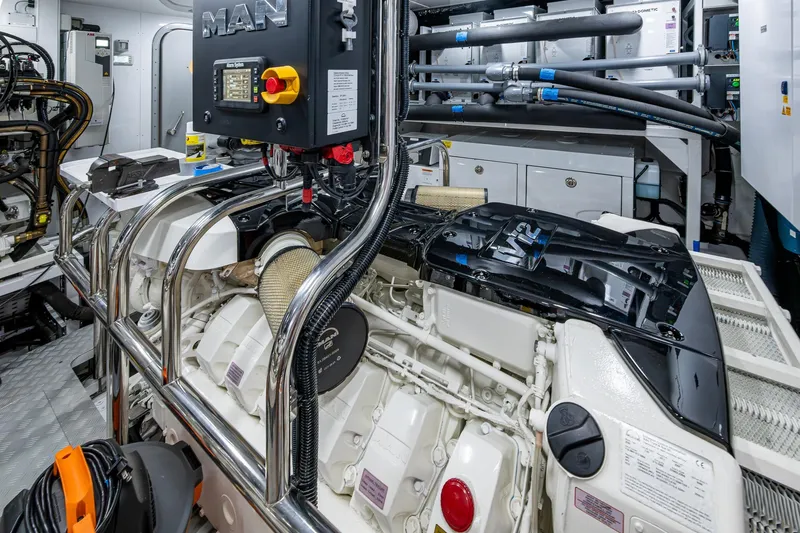 Slide: The Image of Engine room of 2022 Princess X95 yacht featuring MAN engine components. - 103