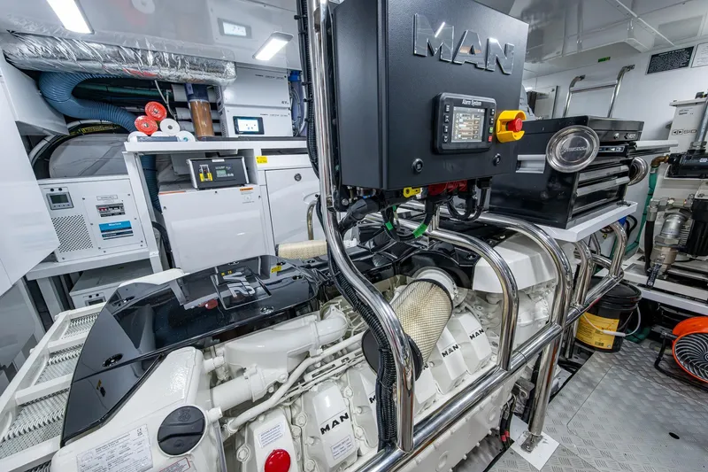 Slide: The Image of Engine room of 2022 Princess X95 yacht featuring MAN engine components. - 104