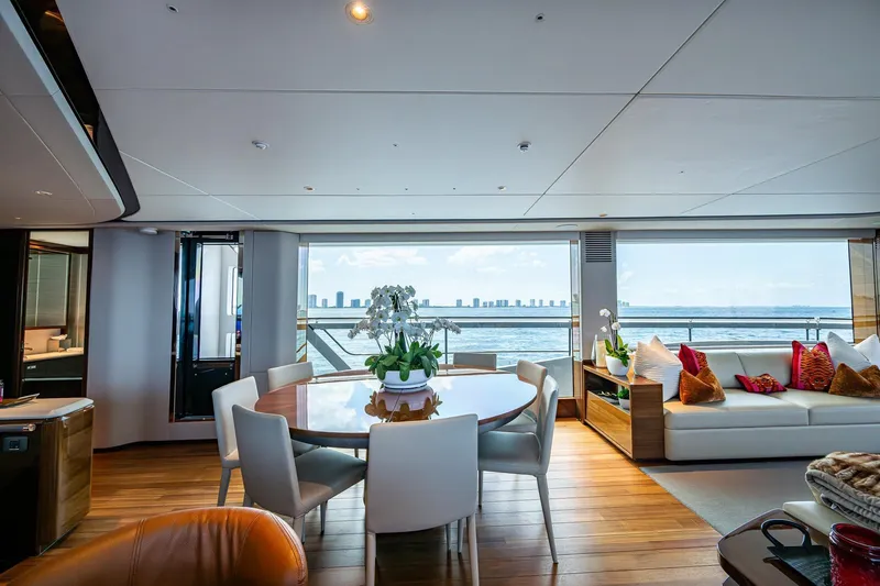 Slide: The Image of Luxurious 2022 Princess X95 yacht interior with elegant dining area and ocean view. - 18