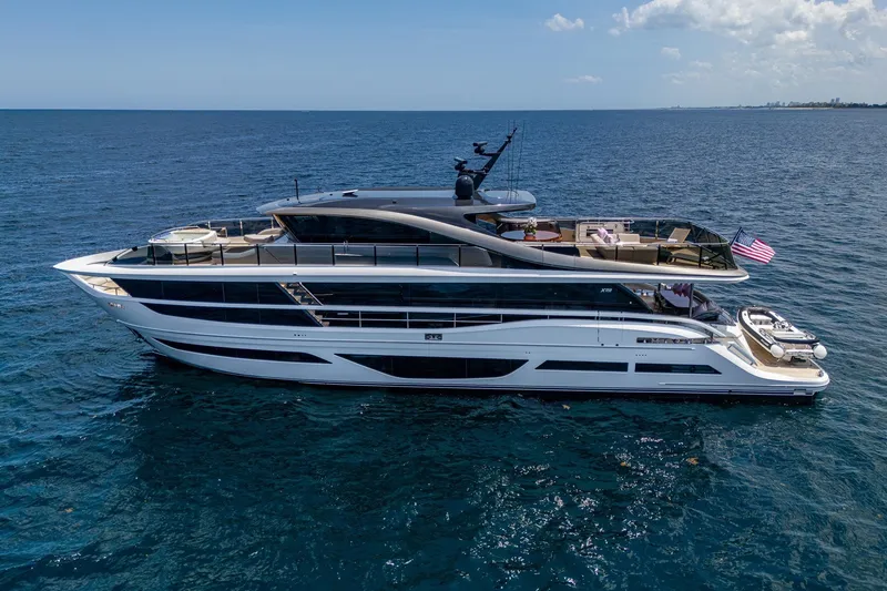 Slide: The Image of Luxurious 2022 Princess X95 yacht cruising on open sea under clear skies. - 2