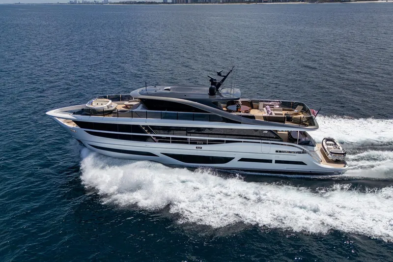 Slide: The Image of Luxurious 2022 Princess X95 yacht cruising on open sea, showcasing sleek design and elegance. - 5