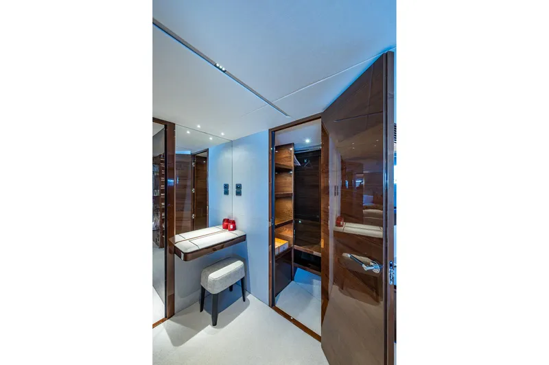 Slide: The Image of Luxurious interior of 2022 Princess X95 yacht with elegant wood finishes and modern design. - 52