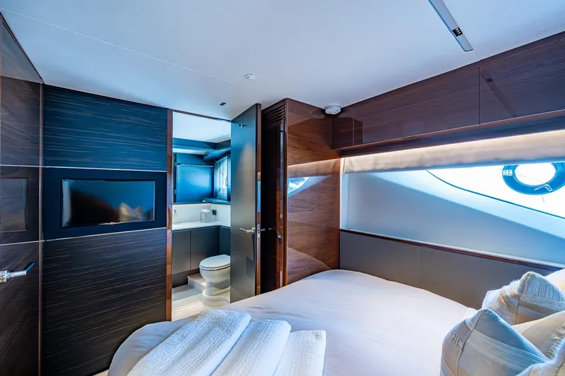 Slide: The Image of Luxurious bedroom interior of 2022 Princess X95 yacht with modern design and ensuite bathroom. - 56