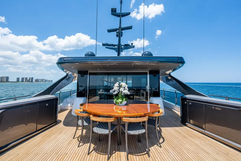 Slide: The Image of Luxurious 2022 Princess X95 yacht deck with elegant dining area and ocean view. - 73