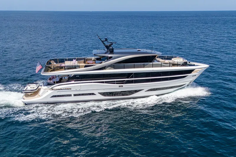 Slide: The Image of Luxurious 2022 Princess X95 yacht cruising on open sea, showcasing sleek design and elegance. - 8