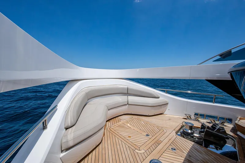 Slide: The Image of Luxurious 2022 Princess X95 yacht deck with elegant seating and ocean view. - 85