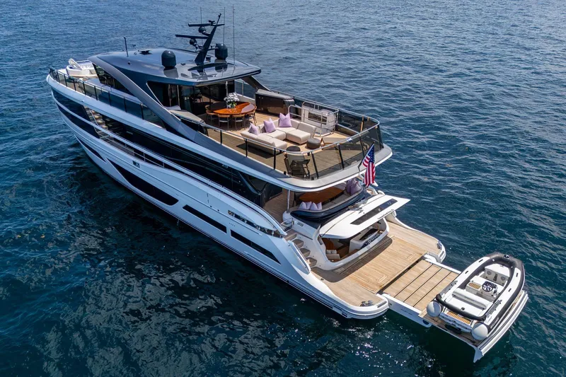 Slide: The Image of Luxurious 2022 Princess X95 yacht cruising on open water, featuring spacious decks and elegant design. - 9