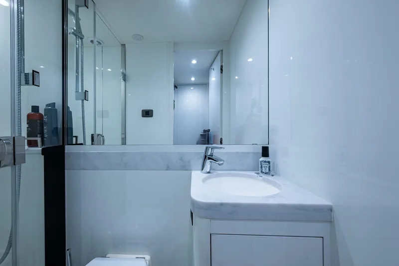 Slide: The Image of Luxurious bathroom interior on 2022 Princess X95 yacht, featuring sleek design and modern fixtures. - 94