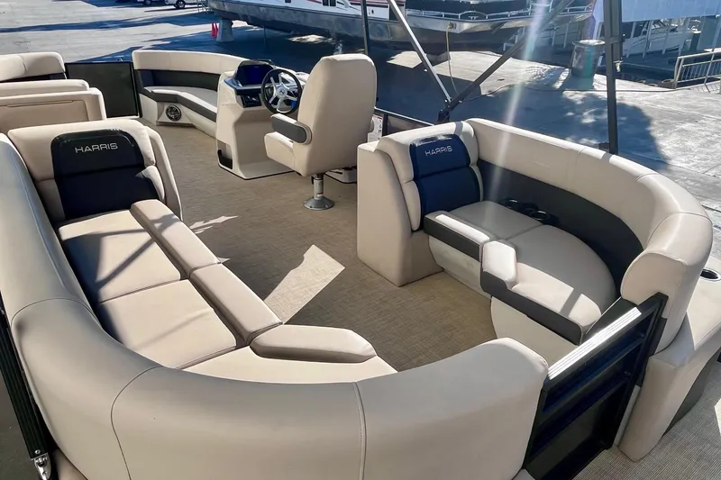 Slide: The Image of Luxurious interior of 2025 Harris Cruiser 230 pontoon boat with plush seating. - 18