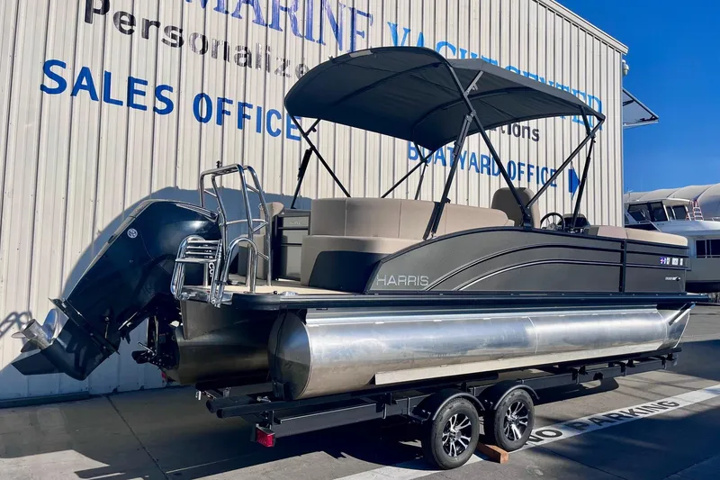 Slide: The Image of 2025 Harris Cruiser 230 pontoon boat on trailer at sales office. - 7