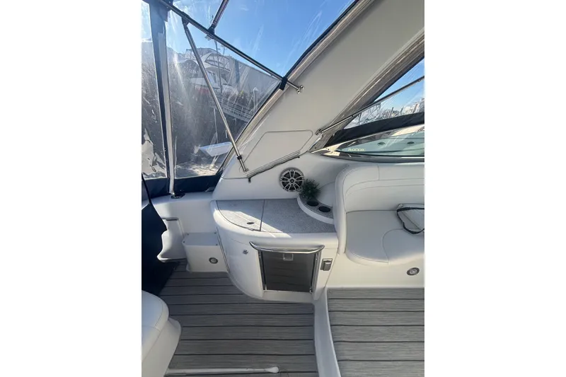 Slide: The Image of 2006 Formula 34 Performance Cruiser interior with white seating and clear canopy. - 14