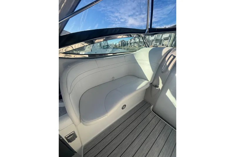 Slide: The Image of 2006 Formula 34 Performance Cruiser interior with seating, speaker, and cup holders. - 16