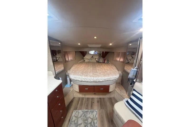 Slide: The Image of Interior of 2006 Formula 34 Performance Cruiser with cozy seating and striped cushions. - 38