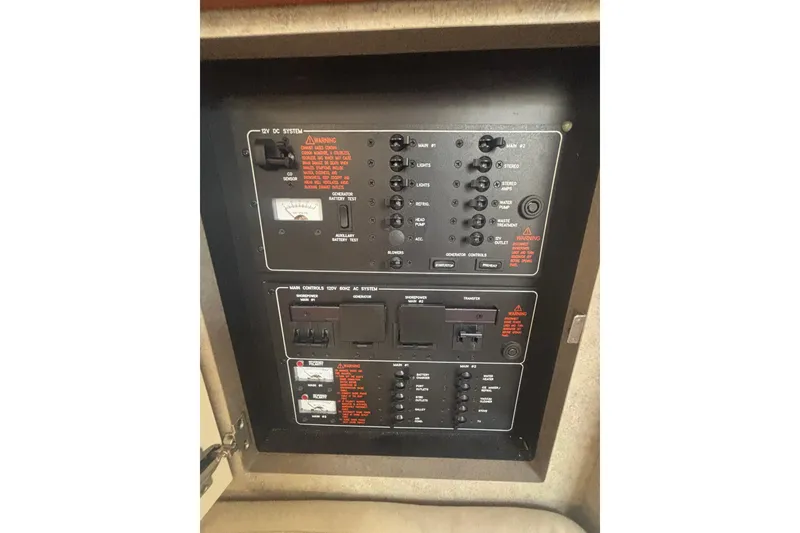 Slide: The Image of 2006 Formula 34 Performance Cruiser bathroom with sink, toilet, and mirror. - 42